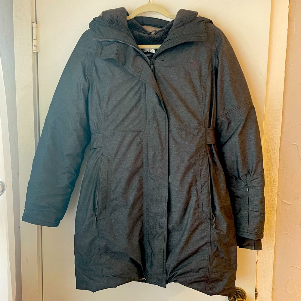 North Face Down Parka with magnetic closure covers in front of the zipper.